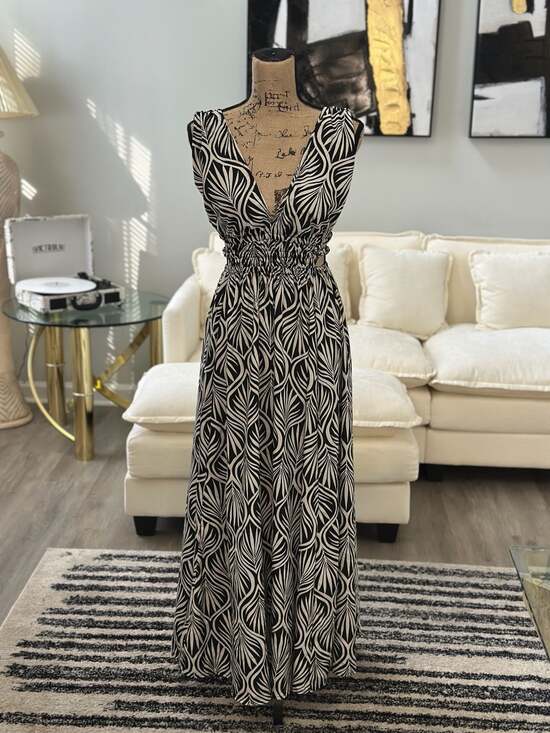 Indulge in Style Black and White Leaf Print Smocked Maxi Dress - Picture 2 of 7